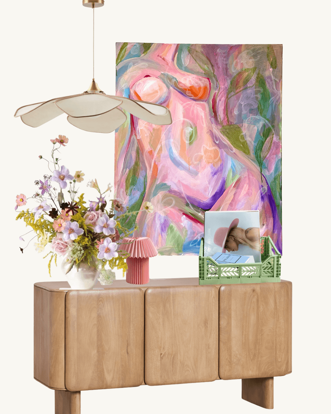 Wooden console table with decorative items including a vase of flowers, a pink lamp, and a colorful abstract painting.