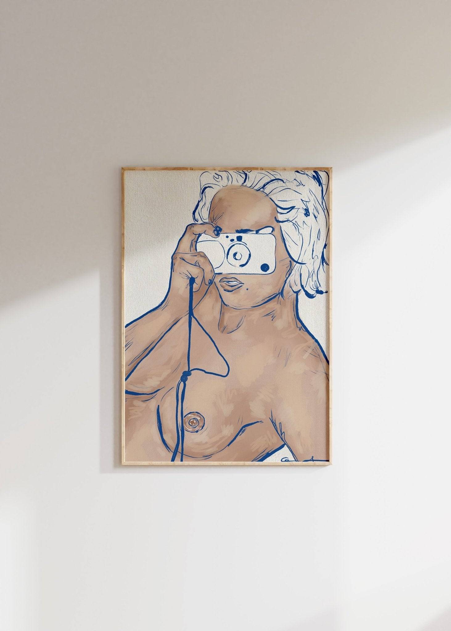 a painting of a nude woman is hanging on a wall